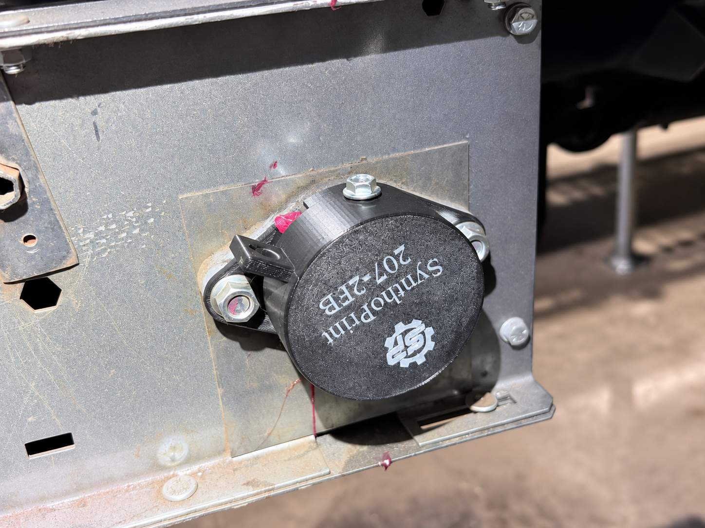 SynthoPrint 207-2FB bearing guard installed on a conveyor