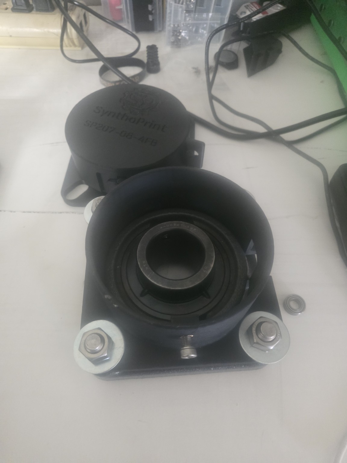 Cover removed to show the bearing and surrounding mounting base